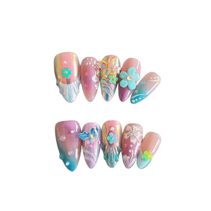 Handmade nail art sculpture set with embossed flower and butterfly designs in four sizes for almond-shaped nails
