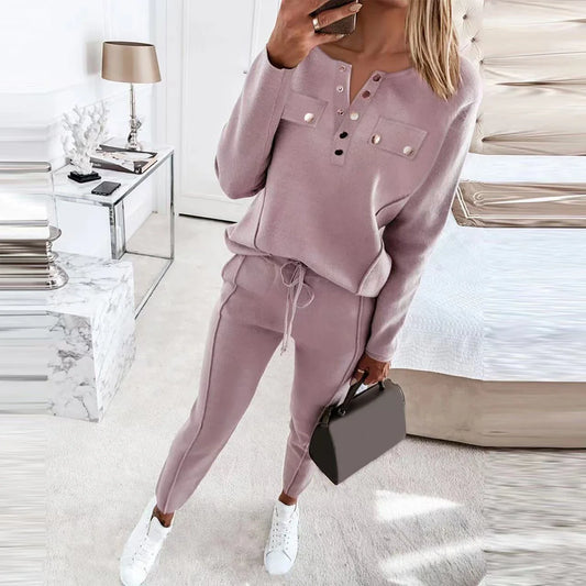 Cozy two-piece loungewear set for women in solid colors, featuring a crewneck top and drawstring-waist pants