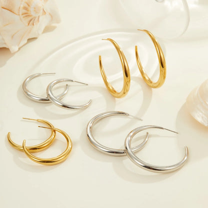Titanium steel geometric round hoop earrings with 18K gold plating available in large and small sizes
