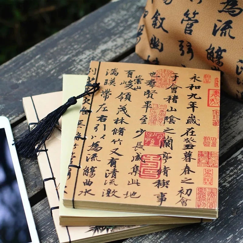 A5 antique wire-bound notebook with classical artwork cover, black oil wax rope binding, and decorative tassels
