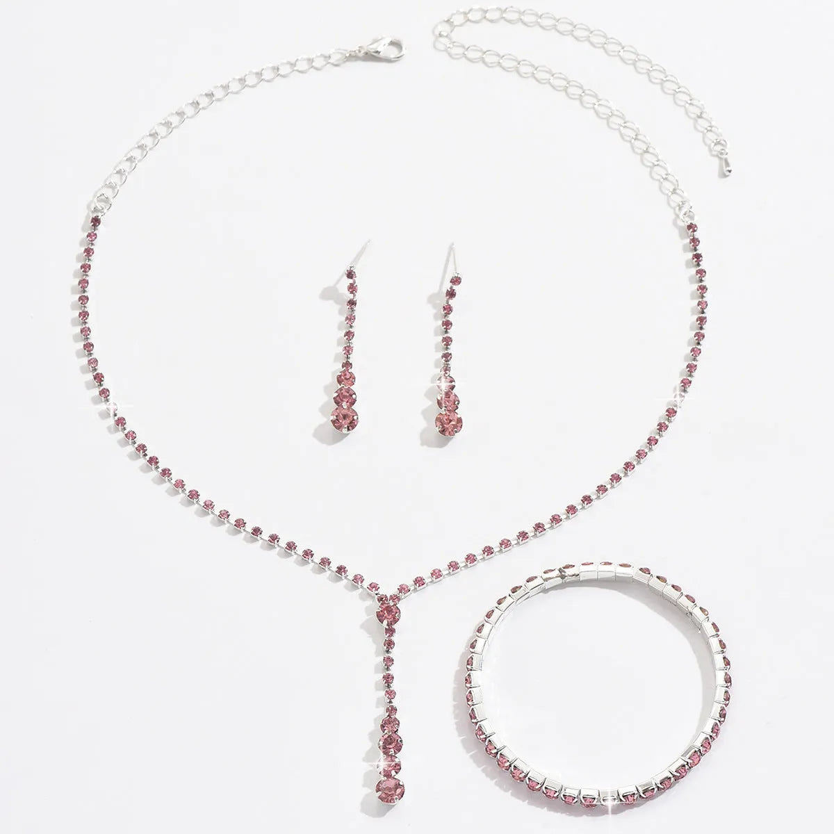 Rhinestone heart pendant jewellery set with necklace, bracelet and earrings in silver pink colour