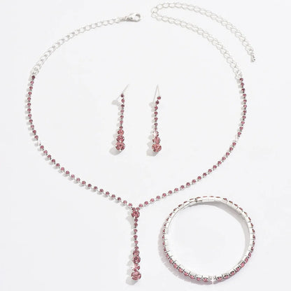 Rhinestone heart pendant jewellery set with necklace, bracelet and earrings in silver pink colour