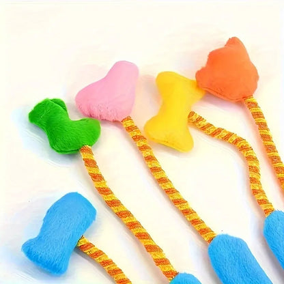 Magic Glove interactive cat toy with bell and trailing elements in yellow and blue colours