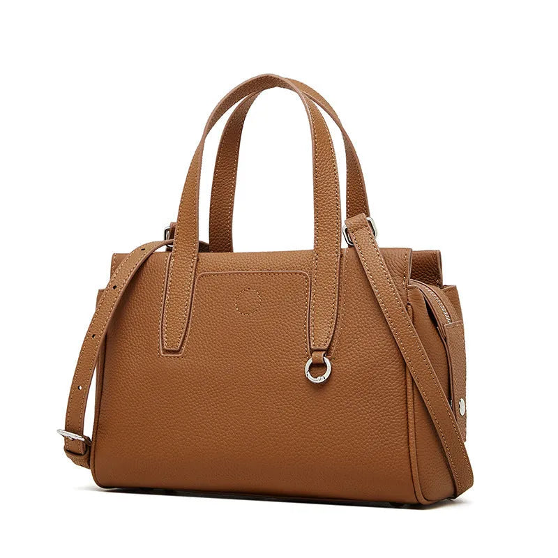 Genuine cowhide leather crossbody bag in a horizontal square shape with a single strap.