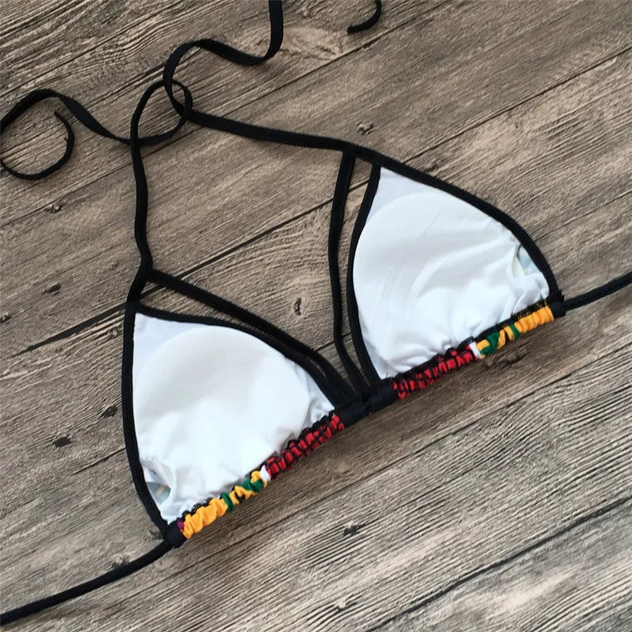 Women's digital print high-waisted bikini set with backless top and split briefs.