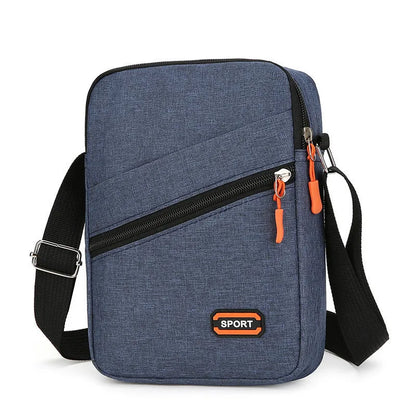 Ultra-light Oxford cloth commuter crossbody bag in solid colour with contrast stitching.