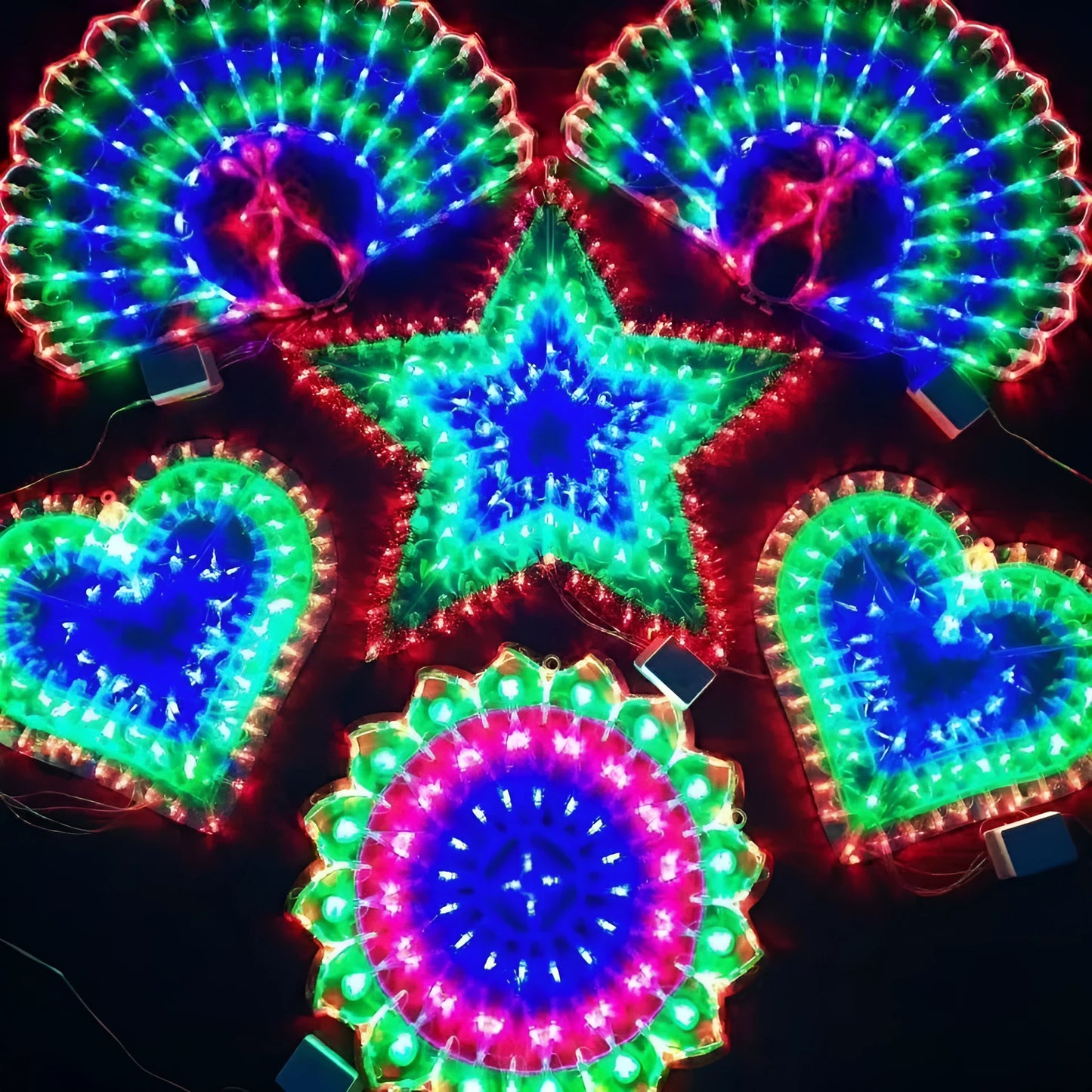 Plug-in outdoor string lights with peacock, love, sunflower, and star designs, rated IP44 for weather resistance.