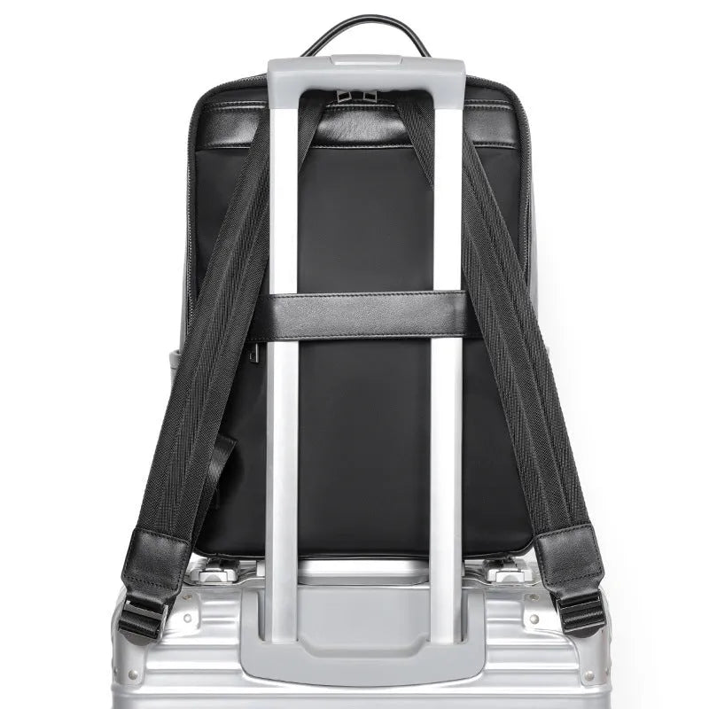 Men's large capacity leather computer backpack with curved back plate in black grain finish