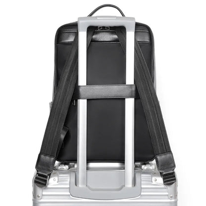 Men's large capacity leather computer backpack with curved back plate in black grain finish