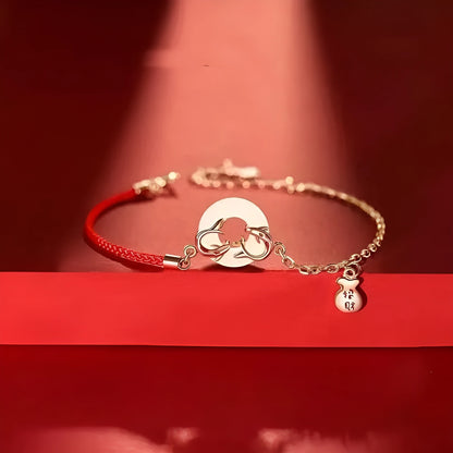 Red rope women's bracelet with electroplated peace buckle and festive koi design elements