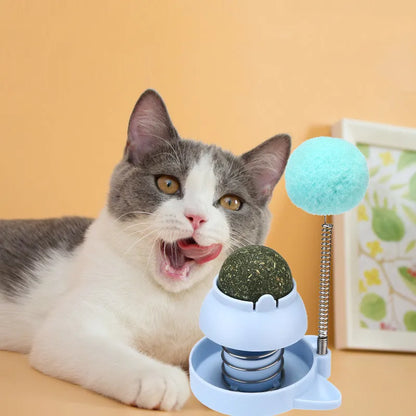 Blue, orange, and pink 55mm lickable mint ball cat toy for dental care and boredom relief.