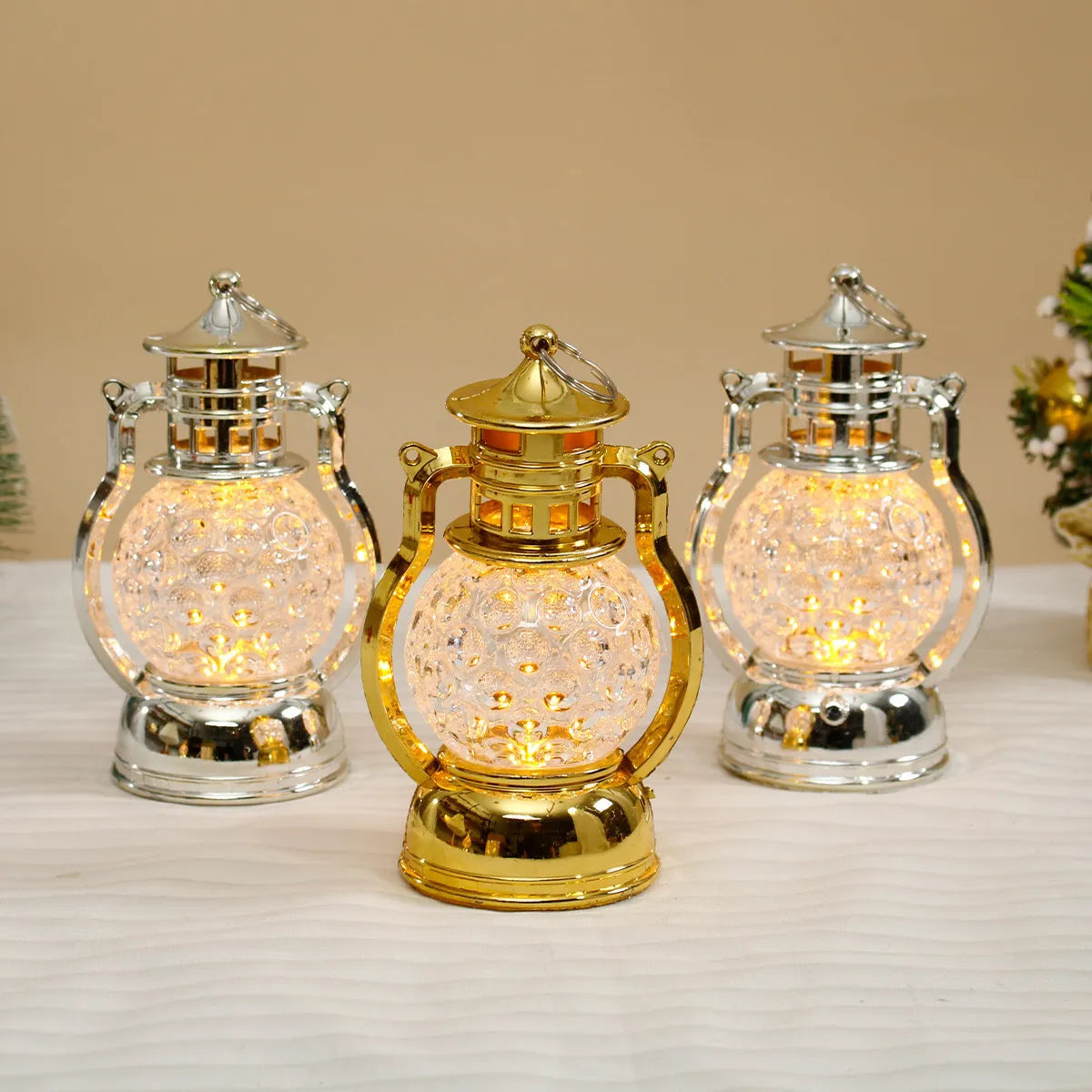 Small retro oil lamp design LED night light in gold or silver finish, 14.5cm tall.