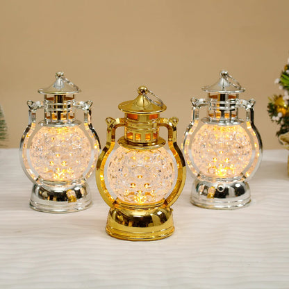 Small retro oil lamp design LED night light in gold or silver finish, 14.5cm tall.