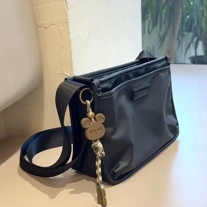 Small square Oxford cloth crossbody bag in trendy cool colour for leisure travel