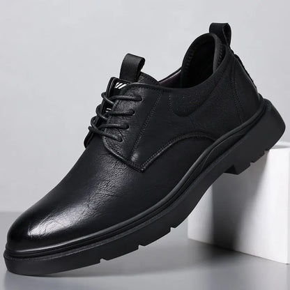 Men's black and brown leather shoes with rubber sole and sewing line detail for business and casual wear
