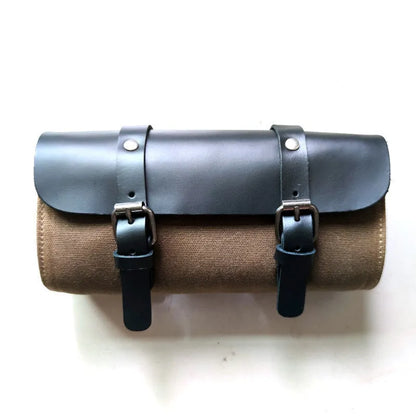 Camel Bag Knight cotton messenger bag in army green with helmet inside, showing internal organiser pockets.