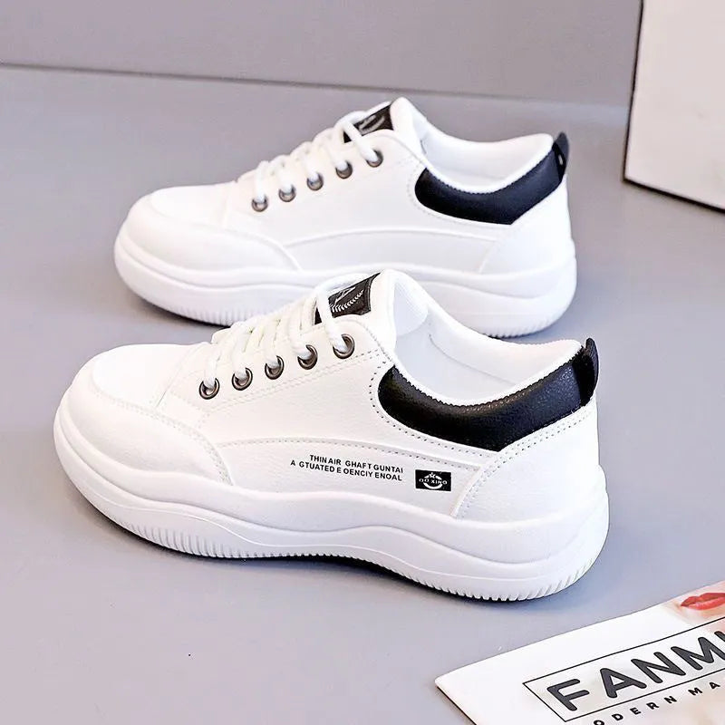 Women's white Korean-style lace-up pumps with cross straps and a 3-5 cm mid-heel on a rubber sole.