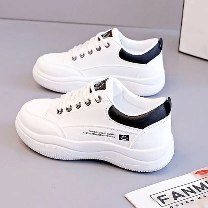Women's white Korean-style lace-up pumps with cross straps and a 3-5 cm mid-heel on a rubber sole.