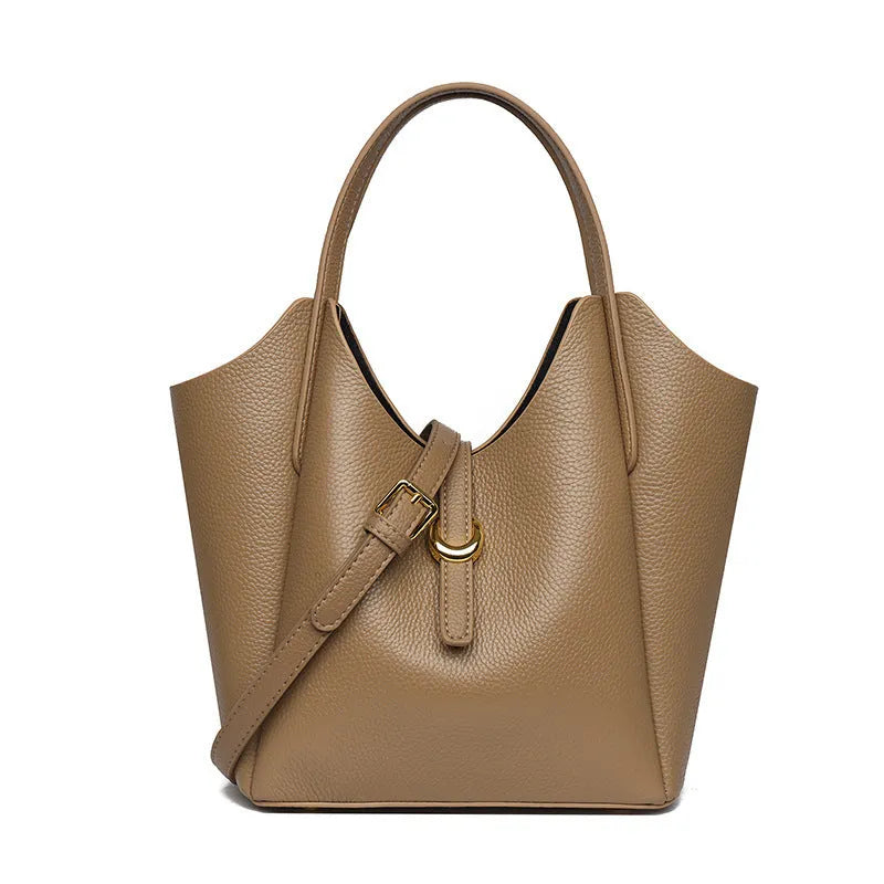 Genuine cowhide leather women's bucket bag in retro style with contrast stitching.