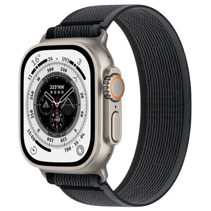 Nylon Apple Watch band with single ring strap closure in multiple colour options on a wrist