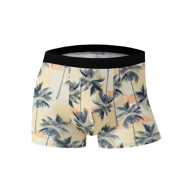 Men's printed ice silk underwear briefs in a floral design, showing mid-waist fit.