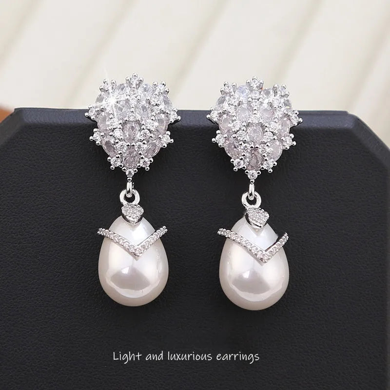Women's drop pearl earrings with zircon inlay on 18K gold-plated copper setting