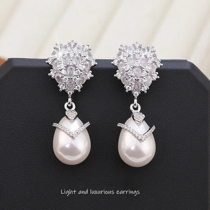 Women's drop pearl earrings with zircon inlay on 18K gold-plated copper setting