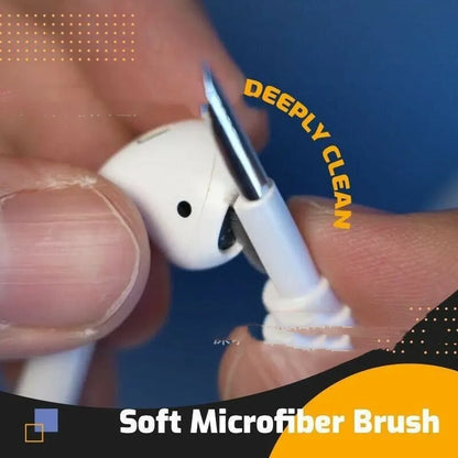 Black and white plastic earbud cleaning pen with a brush for headphones and mobile phones