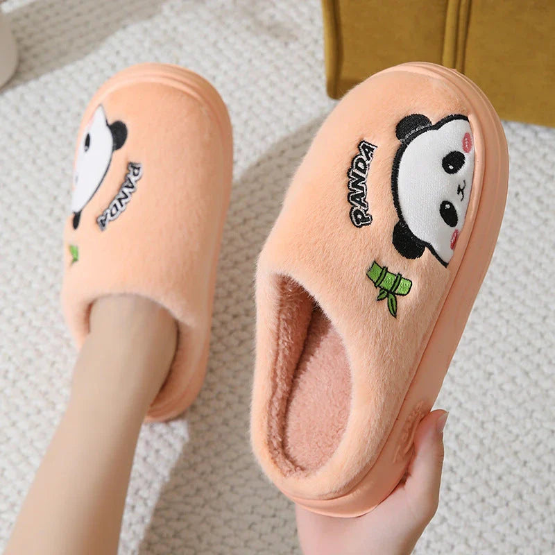 Cozy and stylish panda-themed plush slippers with a thick, cushioned sole for maximum comfort around the house