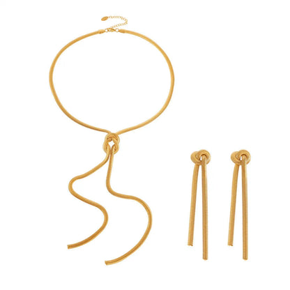 Gold electroplated titanium steel necklace with snake chain and knotted tassel pendant, shown with matching earrings.