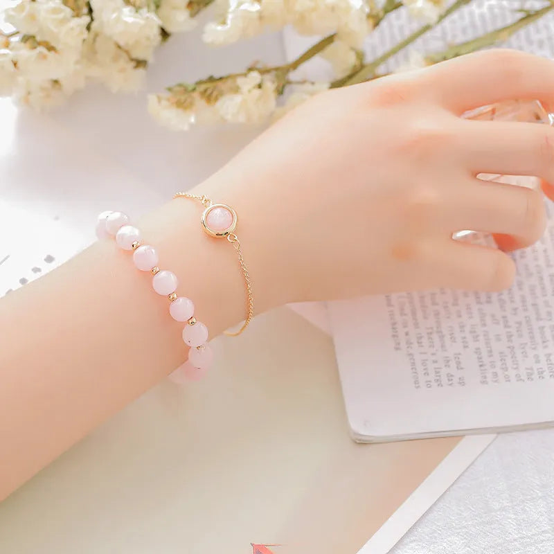 Double-layer women's bracelet with lucky beads and colourful crystals in gold-toned setting