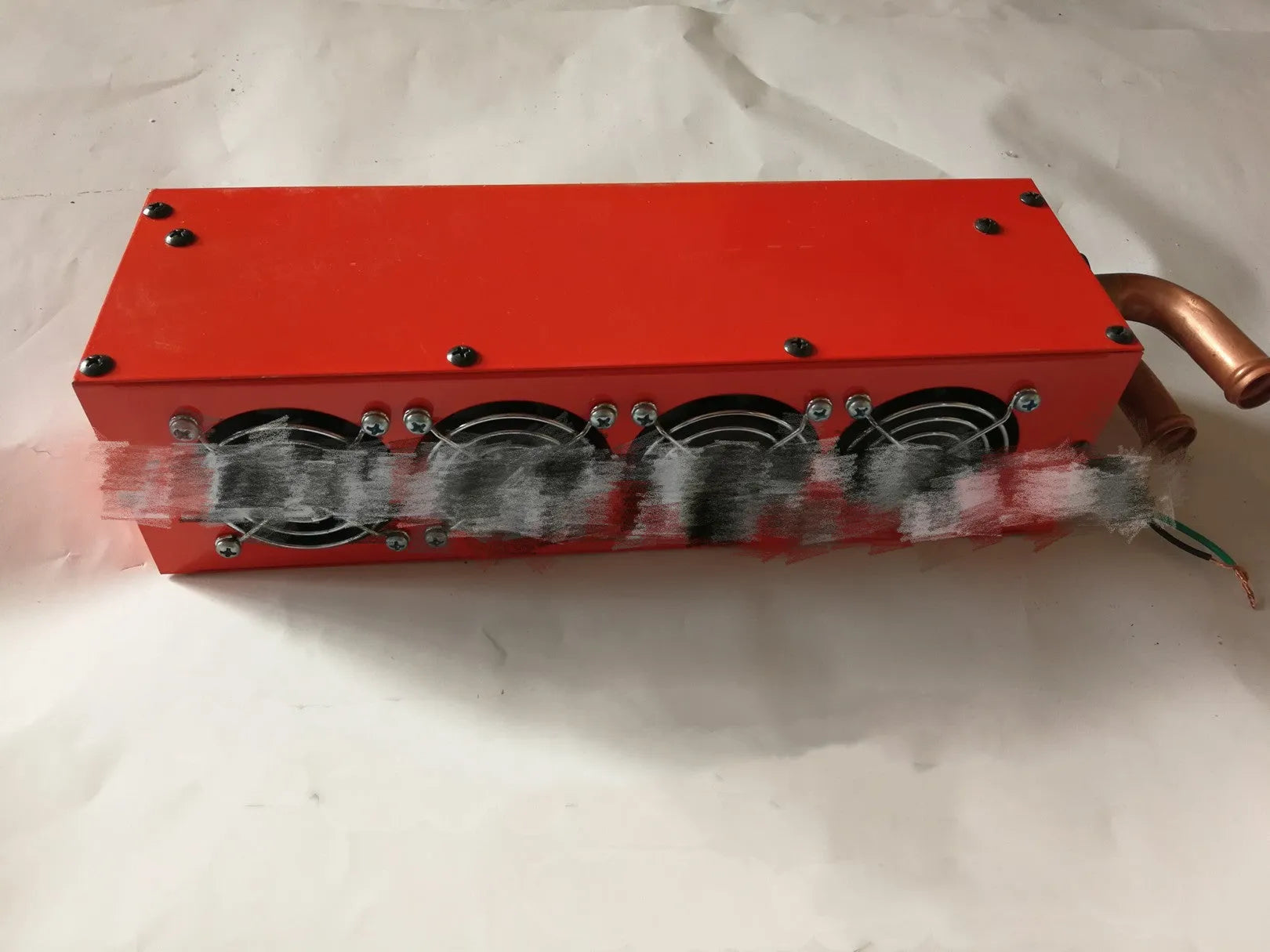 Metal car heater unit with copper pipe connections for vehicle heating system