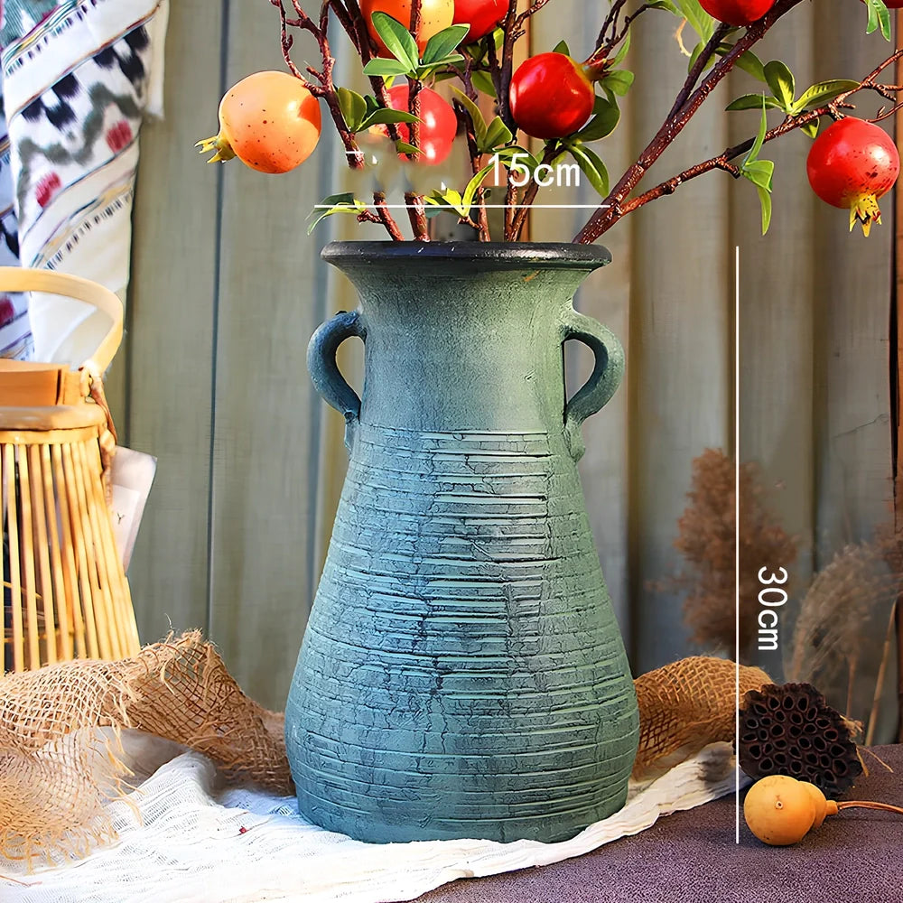 Ceramic mosaic vase with dried flower arrangement, handcrafted surface detailing