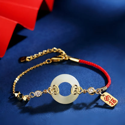 Chinese style sterling silver and Hetian jade jewellery set with bracelet, necklace, and earrings.