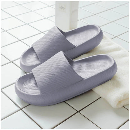 Cozy slip-on slippers in various colors for men and women, featuring soft fabric upper and non-slip EVA soles