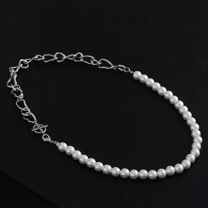 White geometric acrylic clavicle chain necklace with asymmetric design and twisted chain style