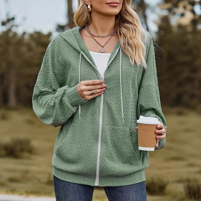 Green hooded zipper coat for women with loose fit, 50cm length, and front zipper closure in casual style.