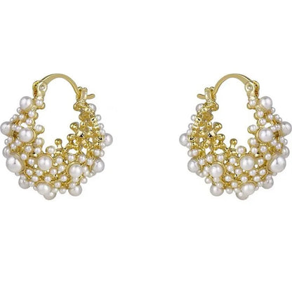 Gold-coloured women's floral basket earrings made from copper with small bead and pearl inlay detail.