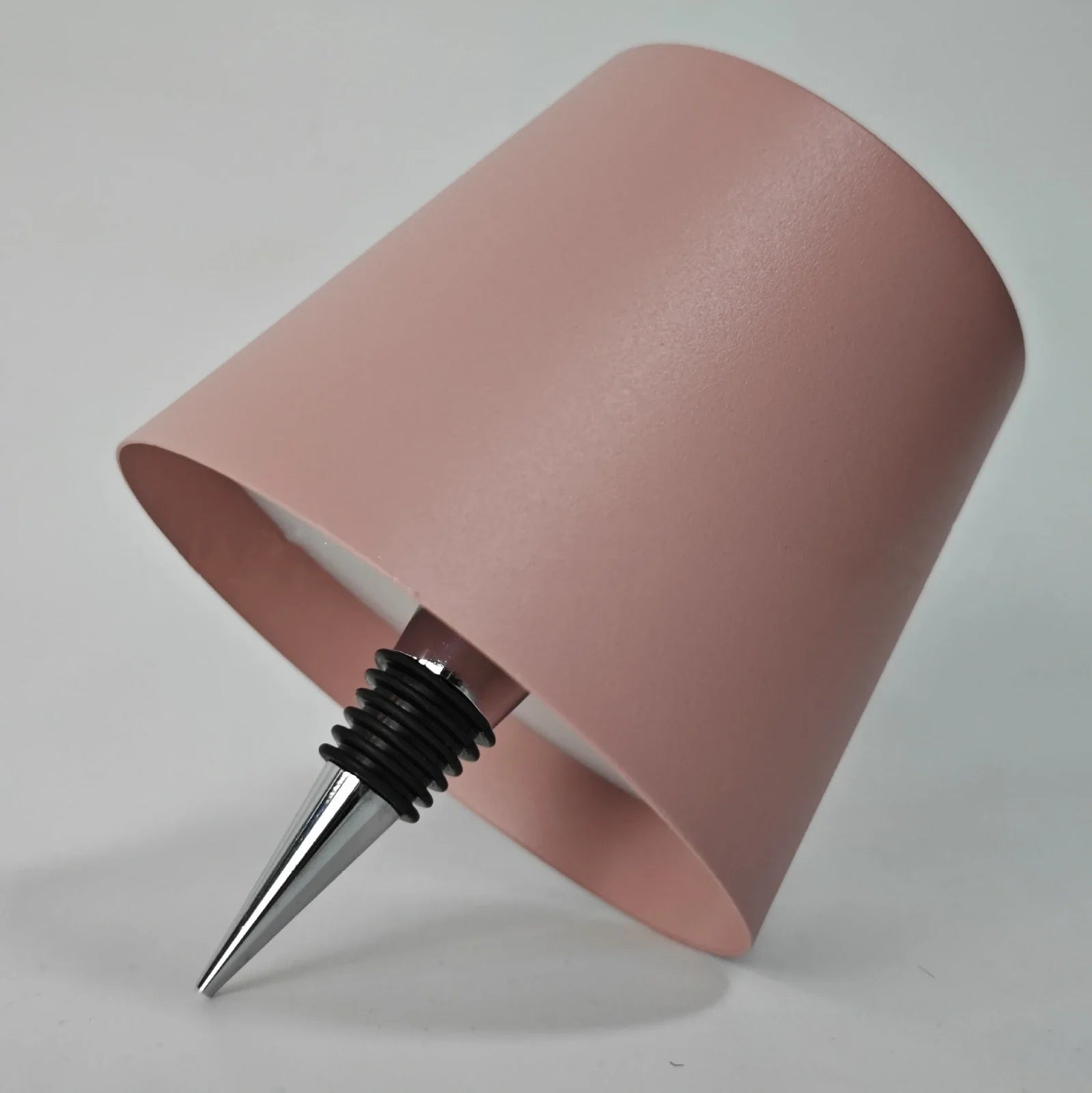 Wireless LED desk lamp in black tricolour finish, bottle-shaped with detachable base and touch control for 2000mAh powered lighting