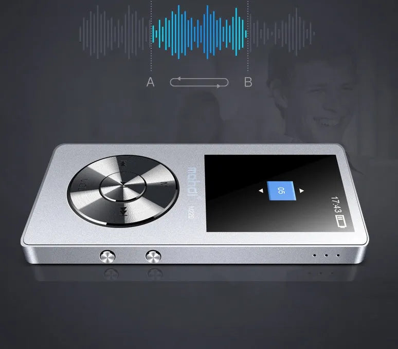 Slim gold metal MP3 player with 1.8-inch screen showing music menu, placed on a table.