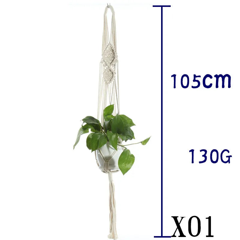 Handmade beige cotton rope net bag holding a plant pot, showing its textured sling design.