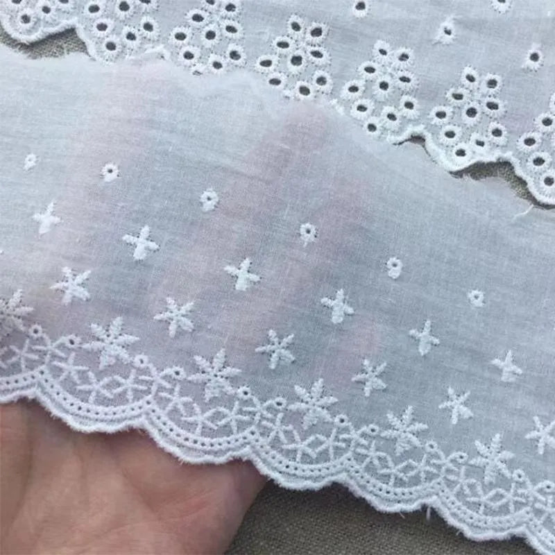 Cotton embroidered lace trim ribbon showing floral cutout patterns in four different width styles