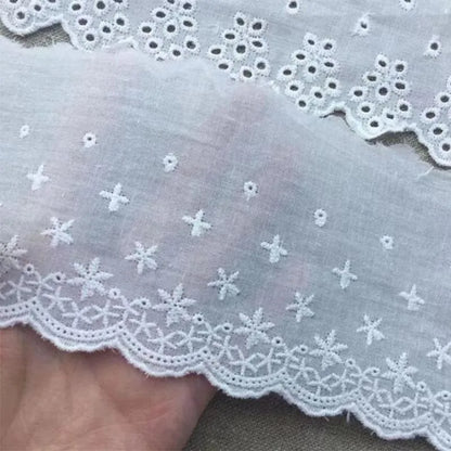 Cotton embroidered lace trim ribbon showing floral cutout patterns in four different width styles