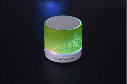 Compact wireless Bluetooth speakers in various colours, featuring premium audio components and sleek, durable design