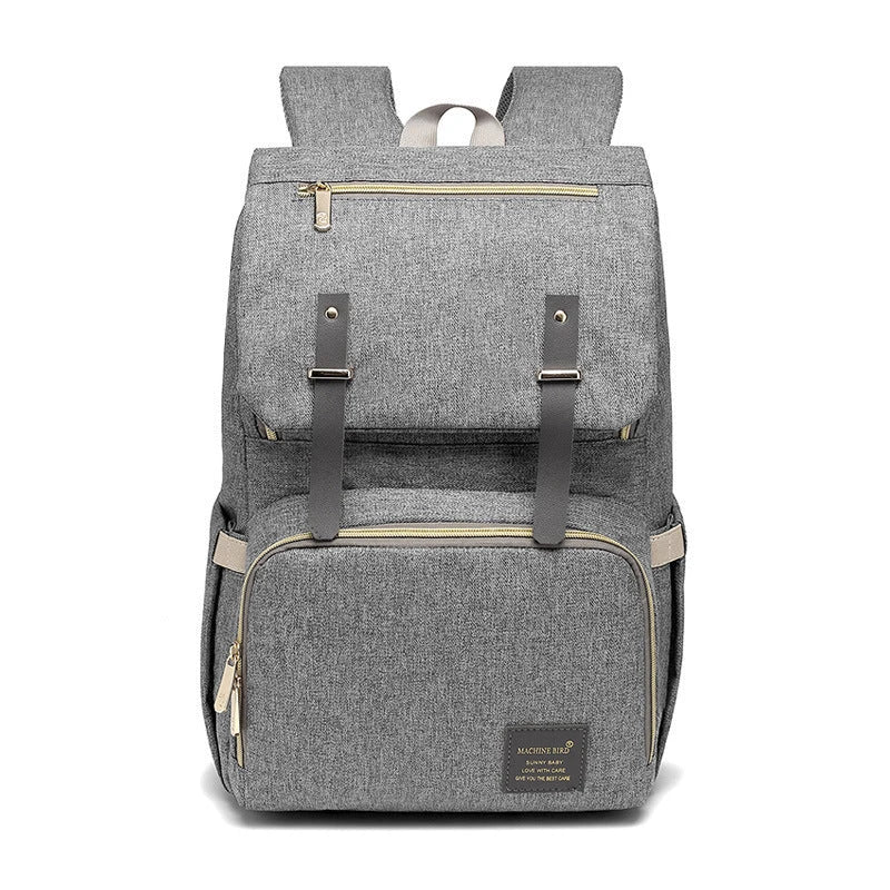 Stylish and functional diaper backpack with large capacity, stroller hooks, and USB charging port for modern parents