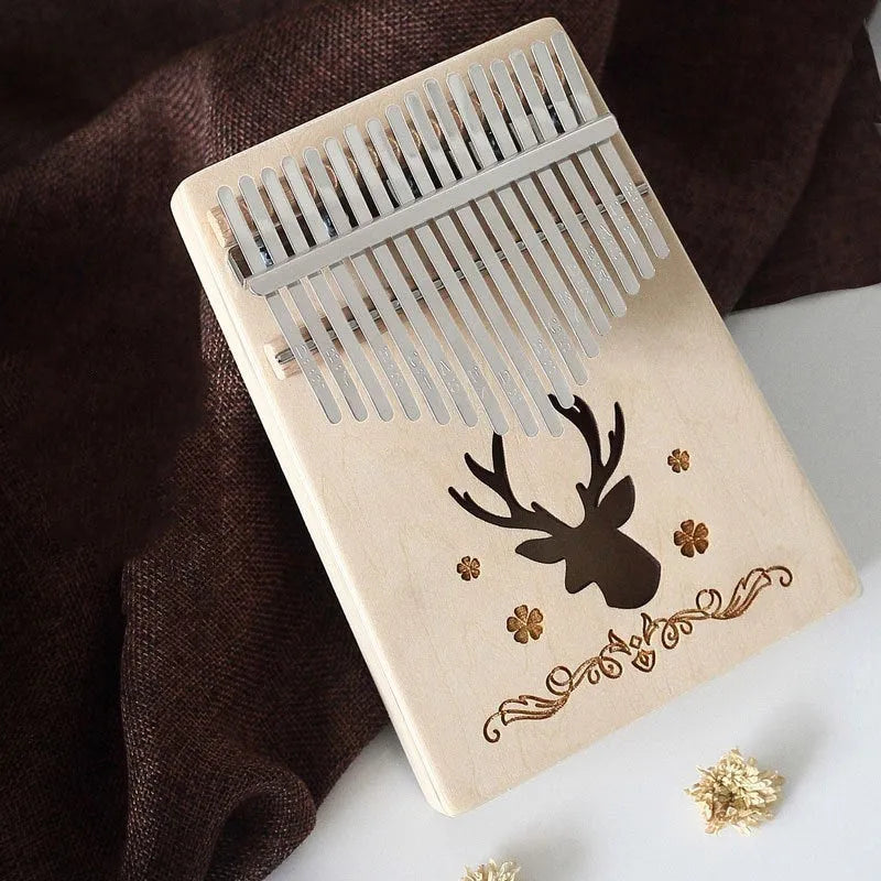 Basswood beginner thumb piano kalimba with no-lacquer finish, available in seven styles including Clouds and Gothic.