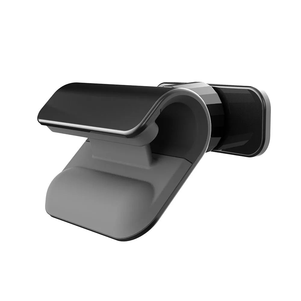Black universal car phone holder with 360-degree rotating head mounted on a car air vent, holding a mobile phone.