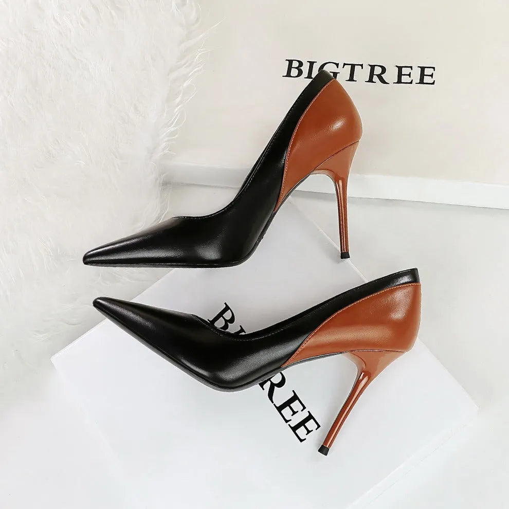 Retro style black stiletto high heels with pointed toe and colour matching pattern