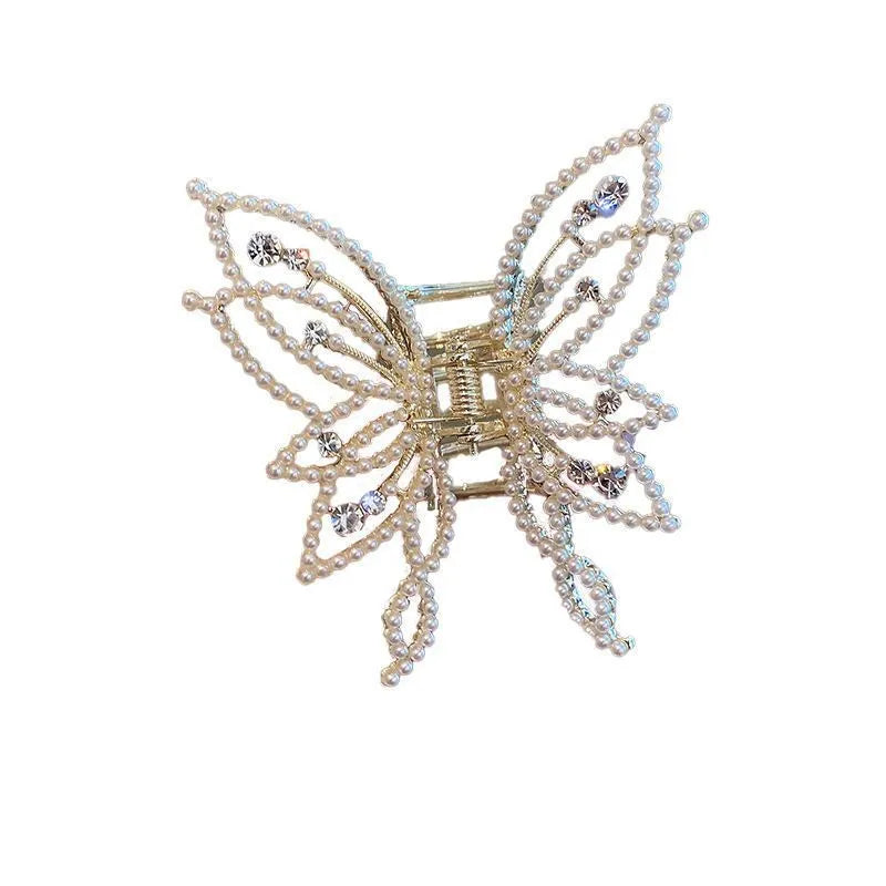 Butterfly hair clip for women with alloy construction and rhinestone or pearl decoration