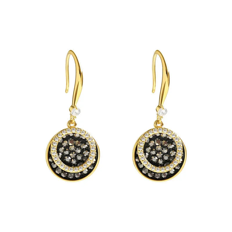 Matte black geometric circle alloy earrings with retro Hong Kong style, shown from the front.